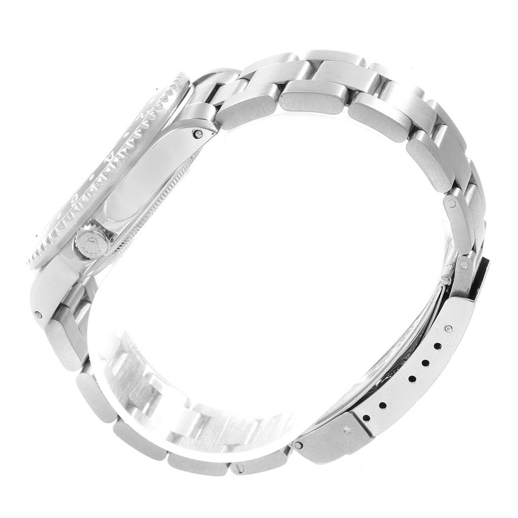 The image shows the side profile and bracelet of a Rolex Vintage Collection 16760 Men's Stainless Steel Black Dial 16760 Men's Stainless Steel Black Dial model watch.