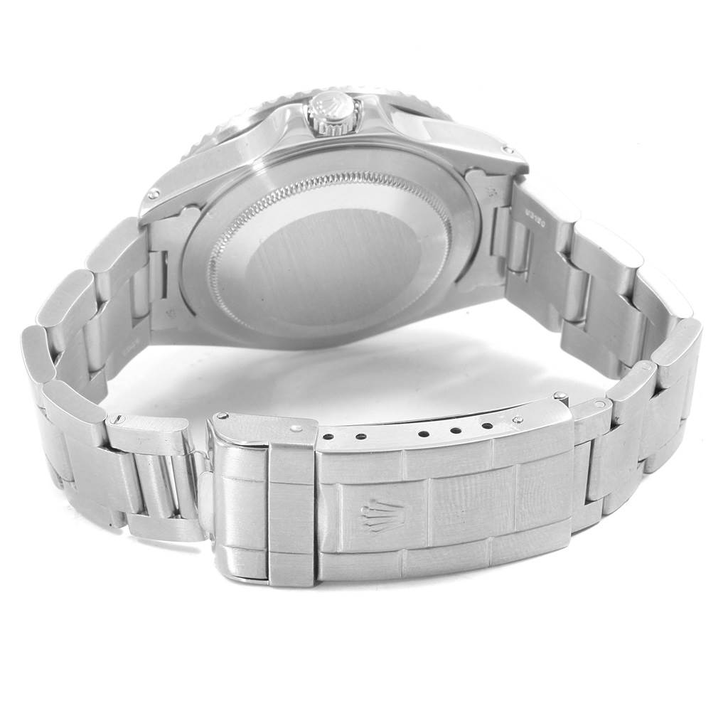 This image shows the back angle of the Rolex Vintage Collection 16760 Men's Stainless Steel Black Dial 16760 Men's Stainless Steel Black Dial watch, highlighting its clasp, case back, and bracelet.