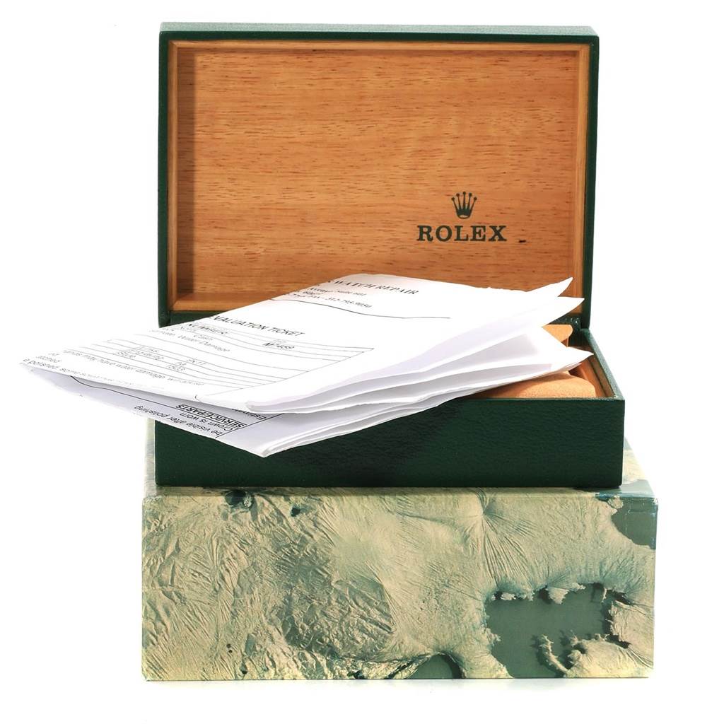 The image shows an open box for the Rolex Vintage Collection 1503 Men's Yellow Gold Silver Dial 1503 Men's Yellow Gold Silver Dial watch, featuring documents, green outer packaging, and wood interior.