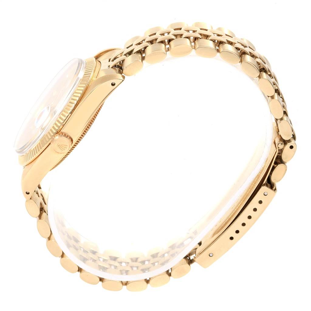 The image shows a side profile view of the Rolex Vintage Collection 1503 Men's Yellow Gold Silver Dial 1503 Men's Yellow Gold Silver Dial watch, highlighting its gold case, crown, and bracelet.