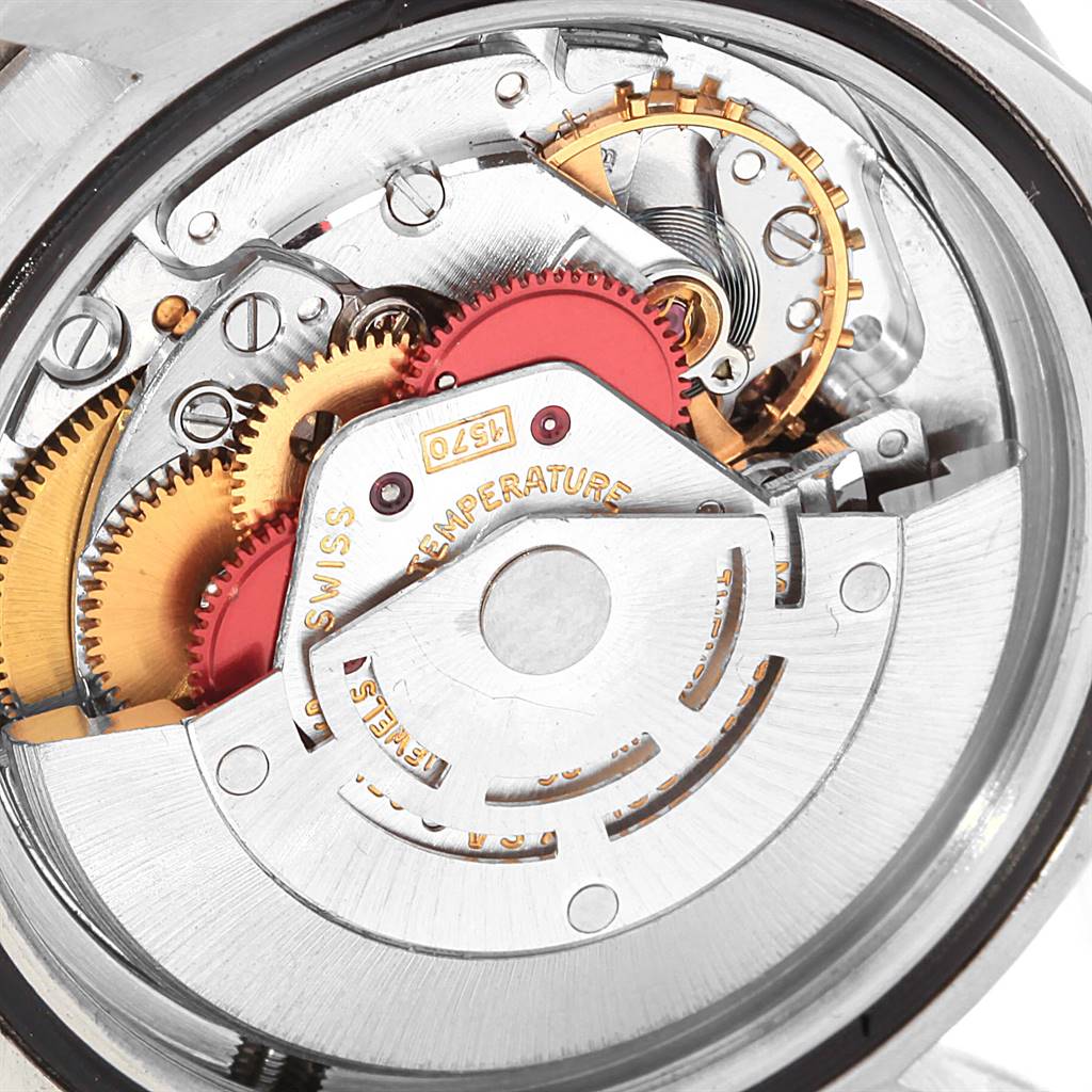 The image shows the internal mechanism of a Rolex Vintage Collection 1665 Men's Stainless Steel Black Dial 1665 Men's Stainless Steel Black Dial model viewed from the back.