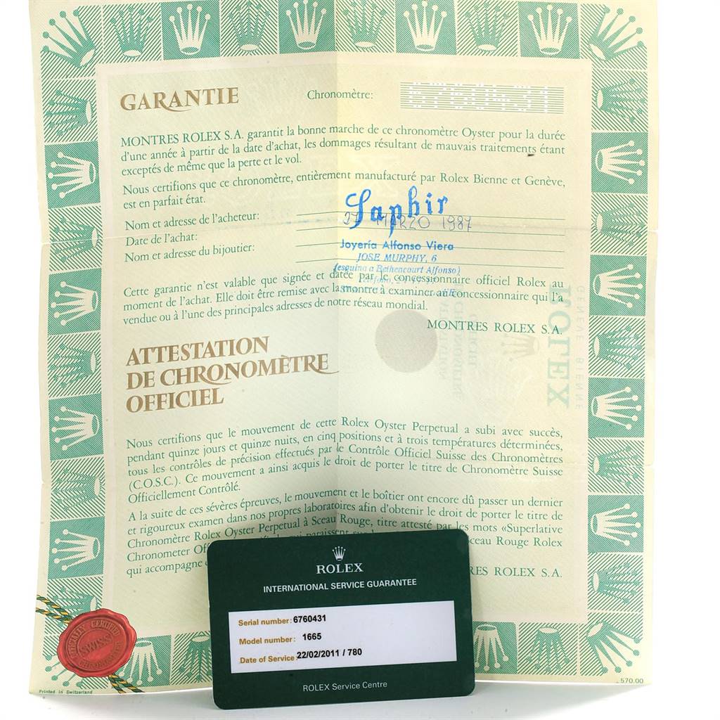 The image shows a warranty certificate and an international service guarantee card for the Rolex Vintage Collection 1665 Men's Stainless Steel Black Dial 1665 Men's Stainless Steel Black Dial model 1665.