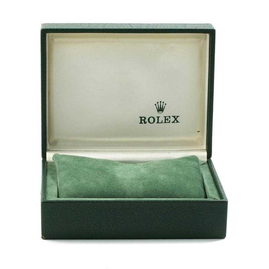 The image shows an open green leather box with a cushion inside, branded with "Rolex" for the Vintage Collection model.