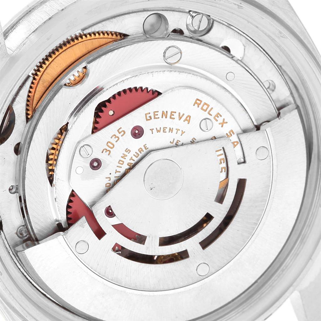 The image shows a close-up of the movement mechanism of the Rolex Vintage Collection 16030 Men
s Stainless Steel Silver Dial 16030 Men
s Stainless Steel Silver Dial watch model 3035.
