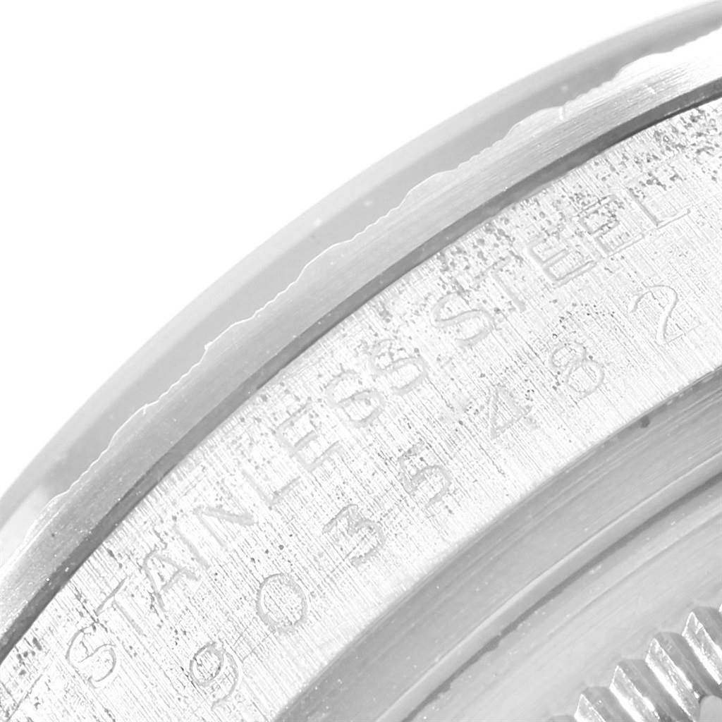 The image shows a close-up of the side profile of the case of a Rolex Vintage Collection 16030 Men
s Stainless Steel Silver Dial 16030 Men
s Stainless Steel Silver Dial watch, highlighting its stainless steel engraving.