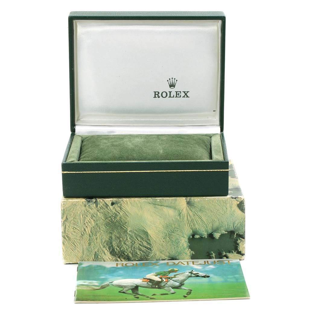 The image shows an open Rolex Vintage Collection 16030 Men's Stainless Steel Silver Dial 16030 Men's Stainless Steel Silver Dial watch box with a green cushion inside, stacked on its outer box, and a "Rolex Datejust" booklet in front.