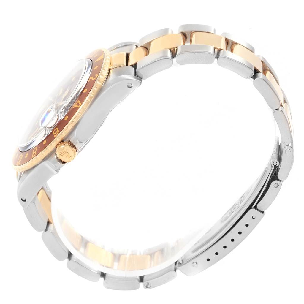 This image shows a side profile of the Rolex Vintage Collection 16753 Men's Stainless Steel Brown Dial 16753 Men's Stainless Steel Brown Dial watch, highlighting its two-tone bracelet, bezel, crown, and case.