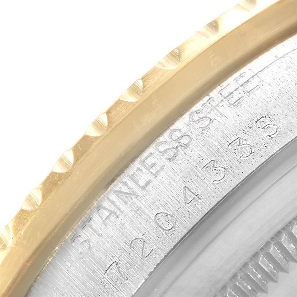 This image shows a close-up of the bezel and case back of the Rolex Vintage Collection 16753 Men's Stainless Steel Brown Dial 16753 Men's Stainless Steel Brown Dial watch.