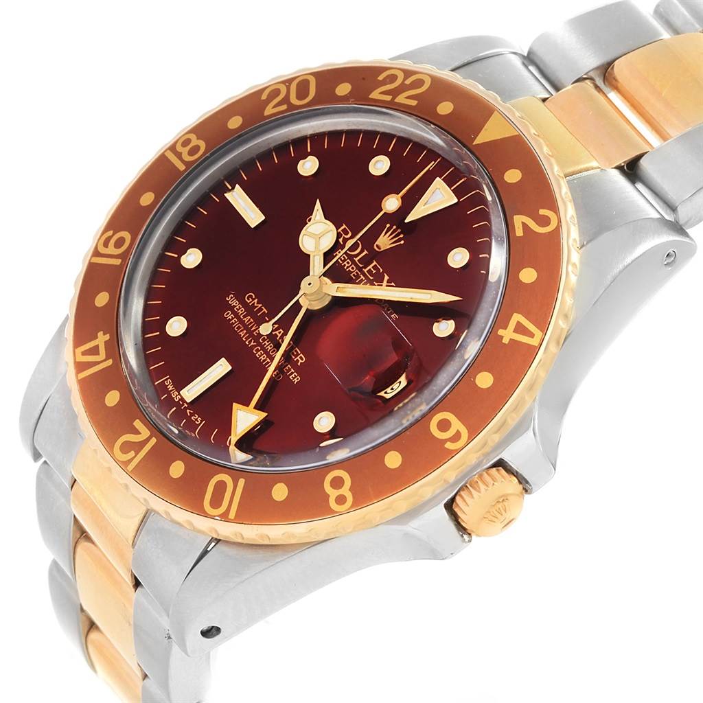 The image shows a Vintage Collection Rolex watch at a diagonal angle, highlighting the face, bezel, crown, and part of the bracelet.