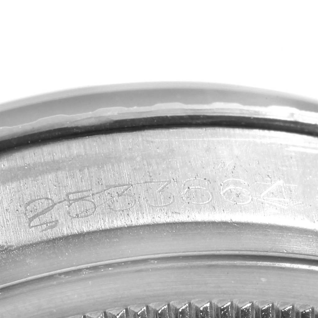 This image shows a close-up of the serial number engraved on the case back edge of a Rolex Vintage Collection 1603 Men's Stainless Steel Silver Dial 1603 Men's Stainless Steel Silver Dial model.