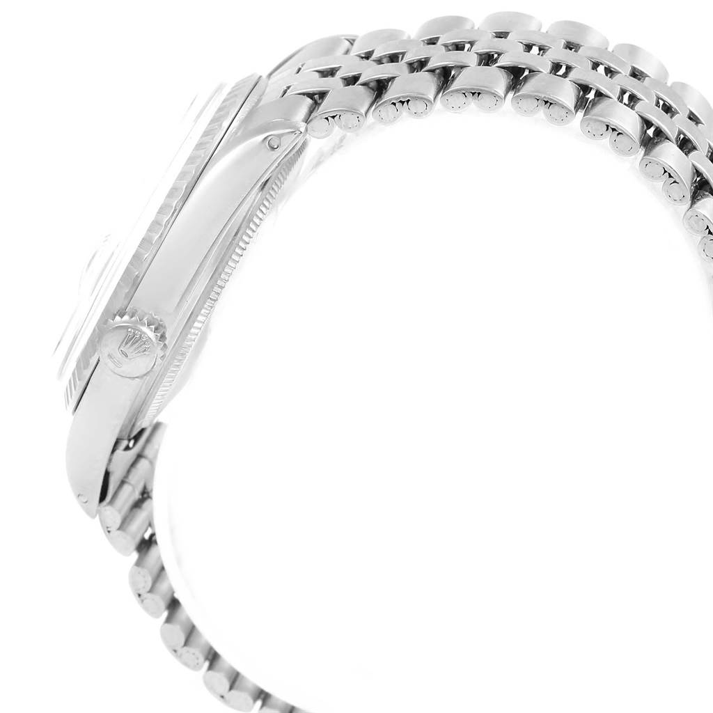 The image shows a side view of the Rolex Vintage Collection 1603 Men's Stainless Steel Silver Dial 1603 Men's Stainless Steel Silver Dial watch, highlighting its case, crown, bezel, and part of the bracelet.