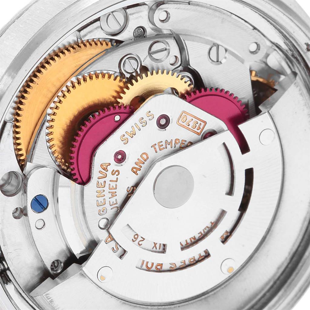 Close-up of the Rolex Vintage Collection 1603 Men's Stainless Steel Silver Dial 1603 Men's Stainless Steel Silver Dial watch movement, showing gears and intricate internal mechanisms from a top-down angle.