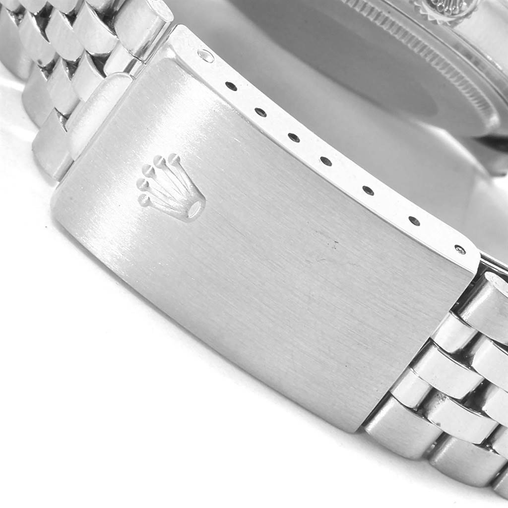 This image shows the clasp and part of the bracelet of a Rolex Vintage Collection 1603 Men's Stainless Steel Silver Dial 1603 Men's Stainless Steel Silver Dial watch.