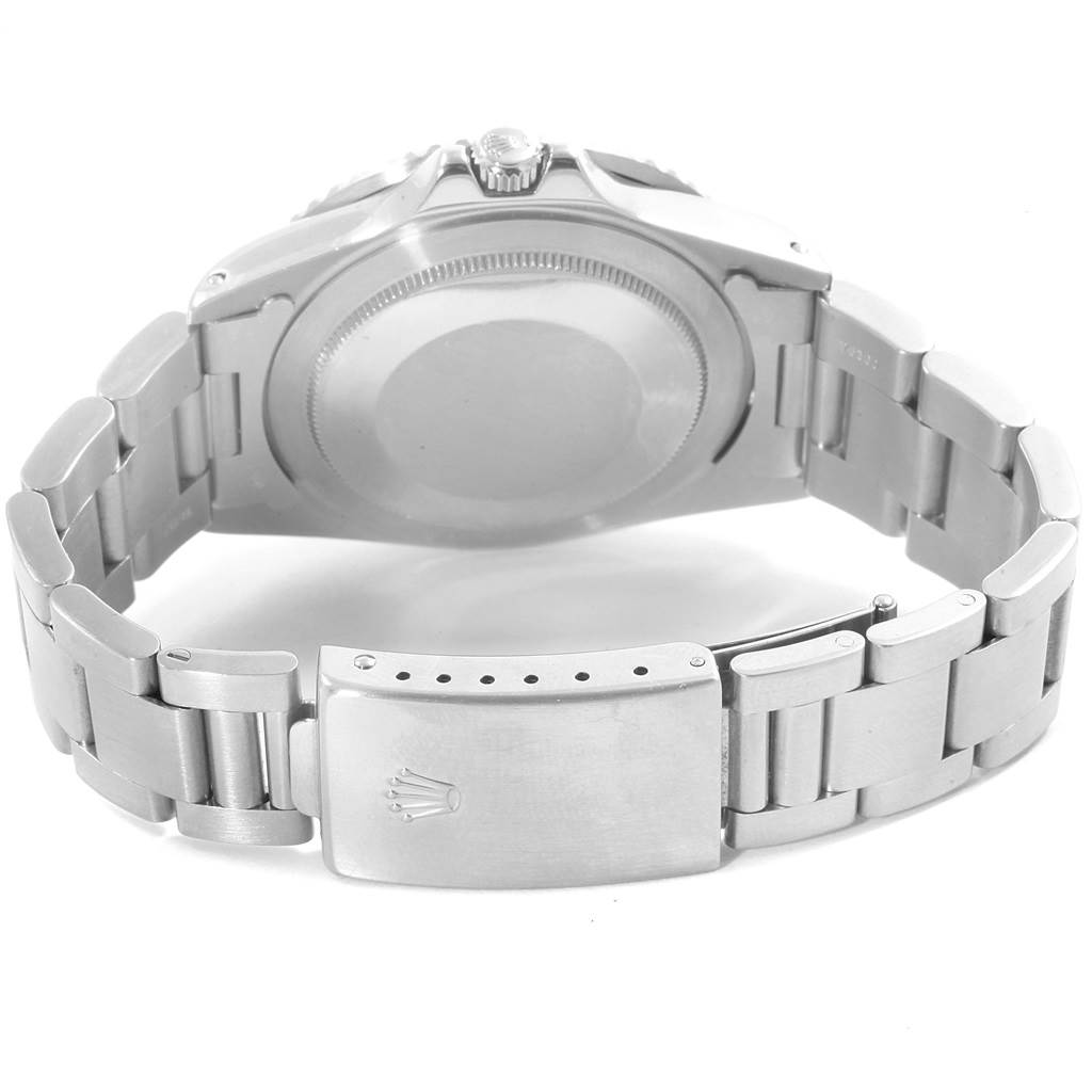 The image shows the back view of a Rolex Vintage Collection 1675 Men's Stainless Steel Black Dial 1675 Men's Stainless Steel Black Dial watch, highlighting its case back and bracelet clasp.