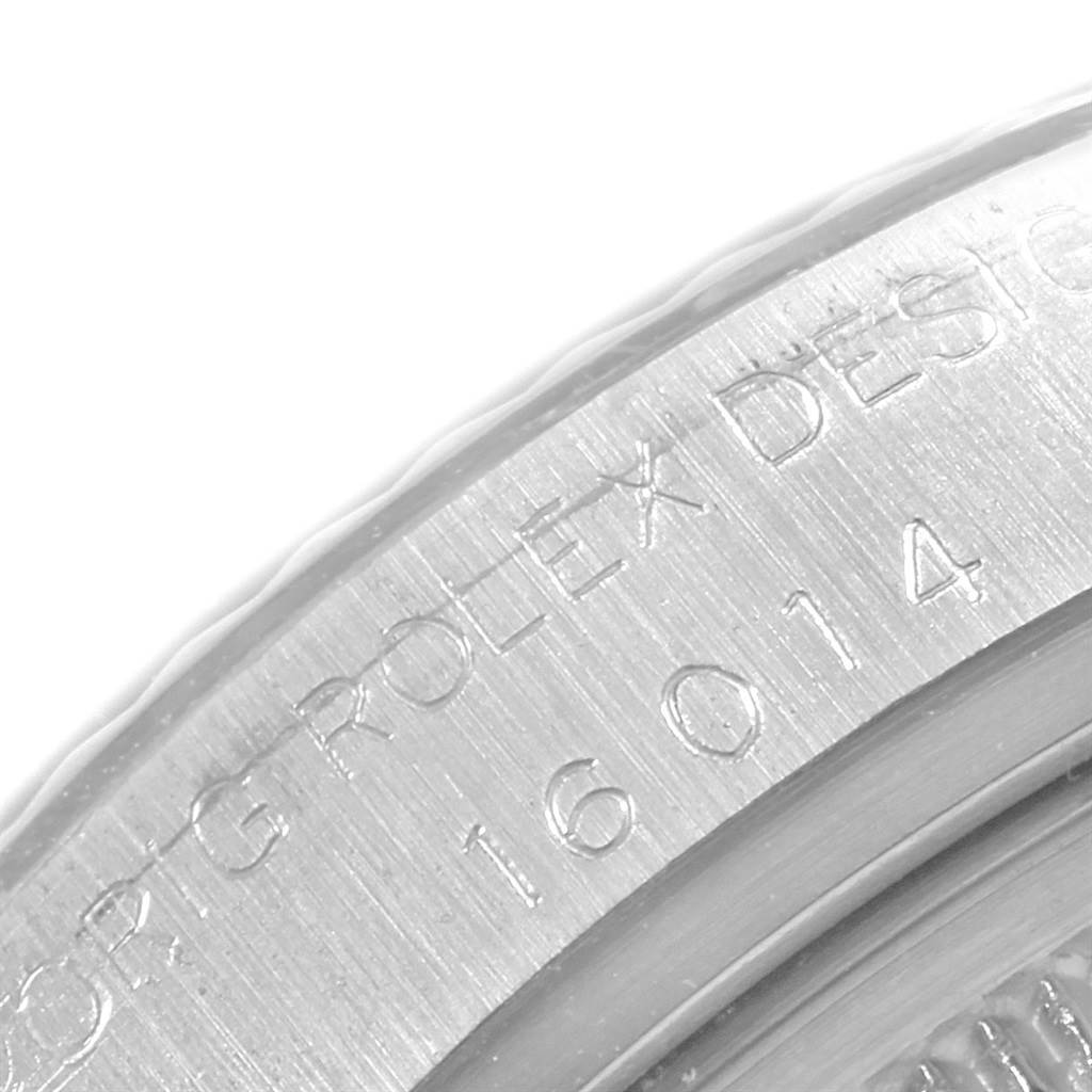 Close-up view of the side engraving on a Vintage Collection Rolex watch, showing part of the model number.