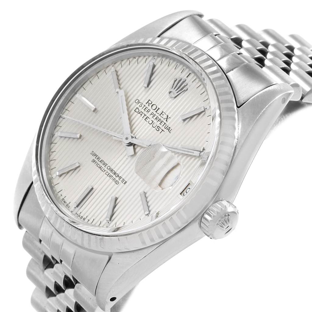 The Rolex Vintage Collection 16014 Men
s Stainless Steel Silver Dial 16014 Men
s Stainless Steel Silver Dial watch is shown from a slight side angle, revealing the face, crown, and part of the bracelet.