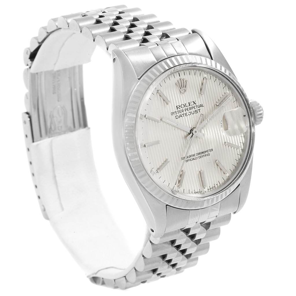 The Rolex Vintage Collection 16014 Men
s Stainless Steel Silver Dial 16014 Men
s Stainless Steel Silver Dial watch is shown at a three-quarter angle, featuring its face, crown, and metal bracelet.