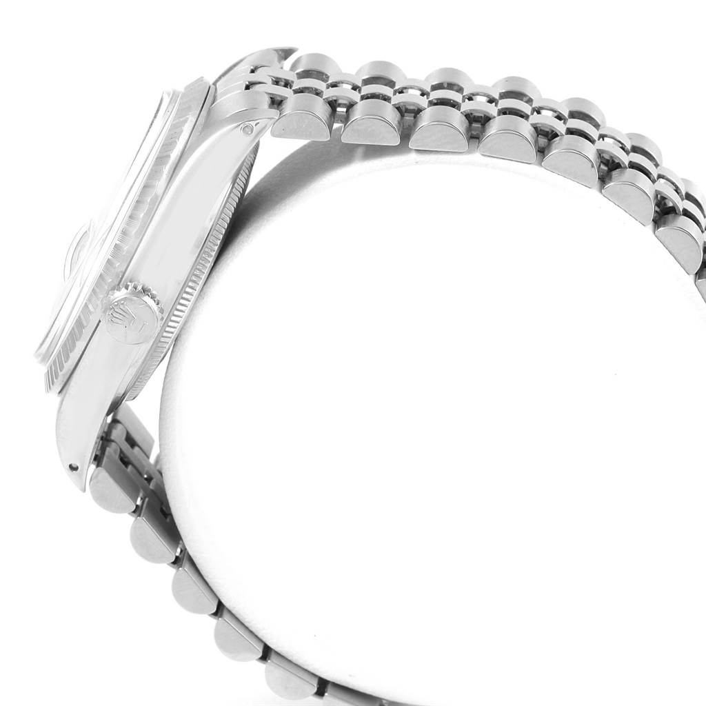 This side view of the Rolex Vintage Collection 16030 Men's Stainless Steel Silver Dial 16030 Men's Stainless Steel Silver Dial watch shows the case, crown, and part of the bracelet.