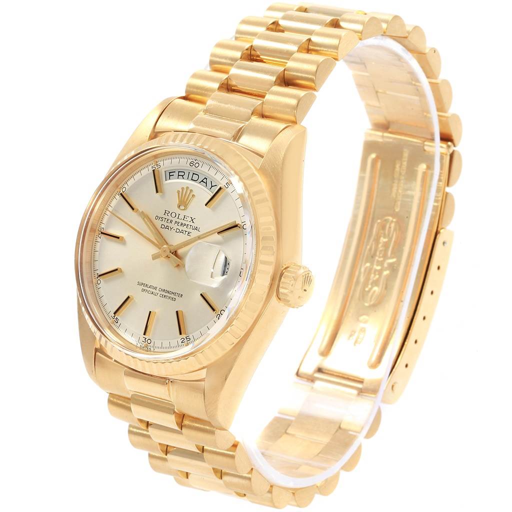 The image shows a Rolex Vintage Collection 1803 Men's Yellow Gold Silver Dial 1803 Men's Yellow Gold Silver Dial model from an angled side view, featuring the dial, day-date display, and the gold bracelet.