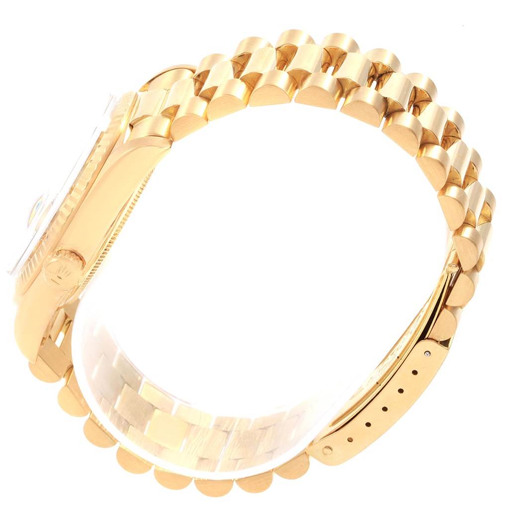 The image shows a side angle of the gold bracelet and part of the case of the Rolex Vintage Collection 1803 Men's Yellow Gold Silver Dial 1803 Men's Yellow Gold Silver Dial model.