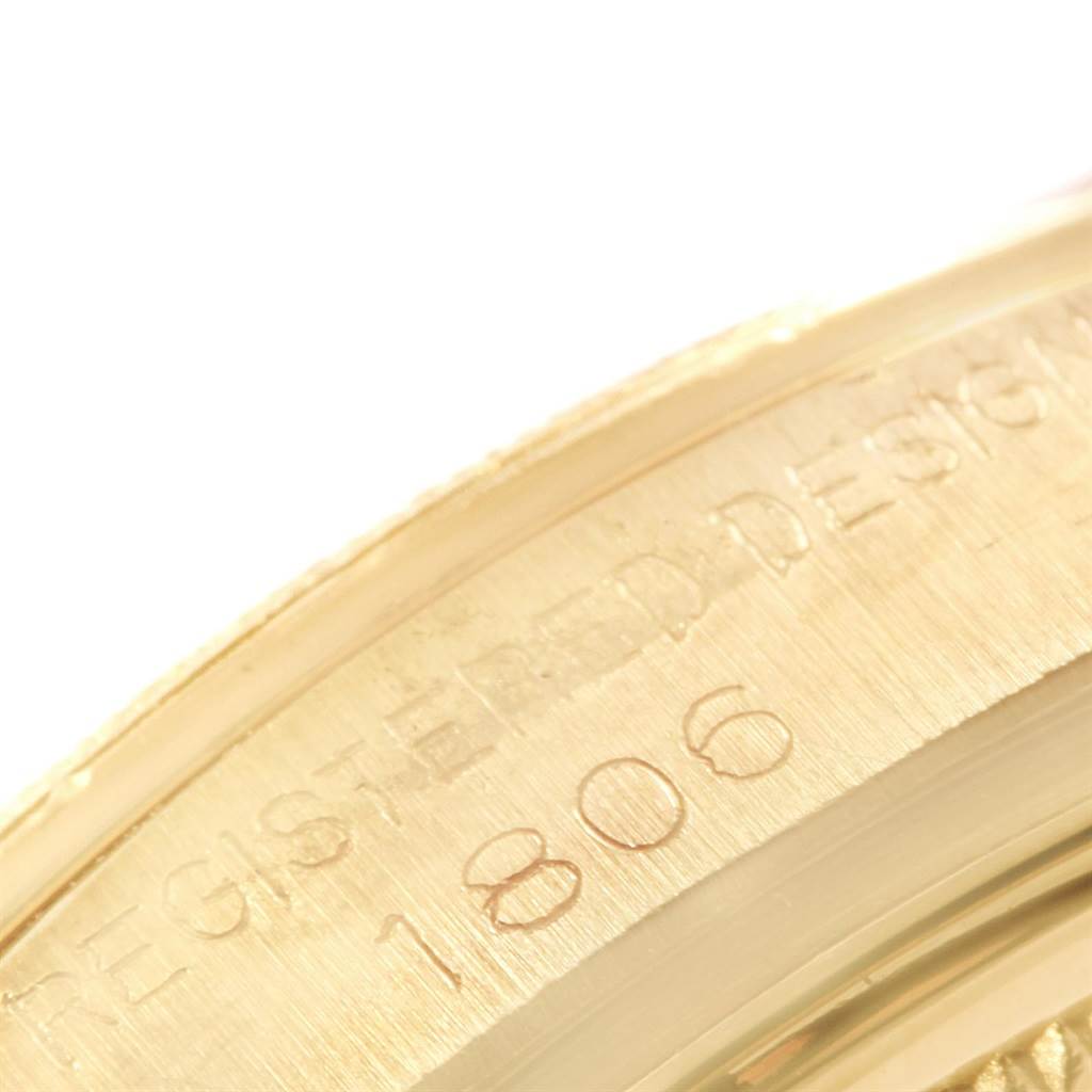 This image shows a close-up angle of the serial number engraved on a Vintage Collection Rolex watch case.