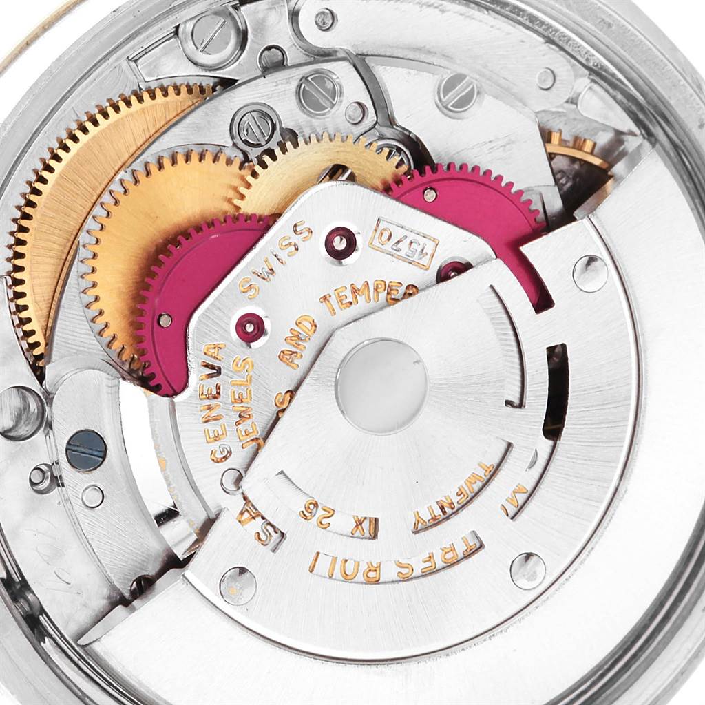 This close-up shows the inner mechanical movement of the Rolex Vintage Collection 1505 Men's Steel and Gold (two tone) White Dial 1505 Men's Steel and Gold (two tone) White Dial watch, highlighting gears and components.
