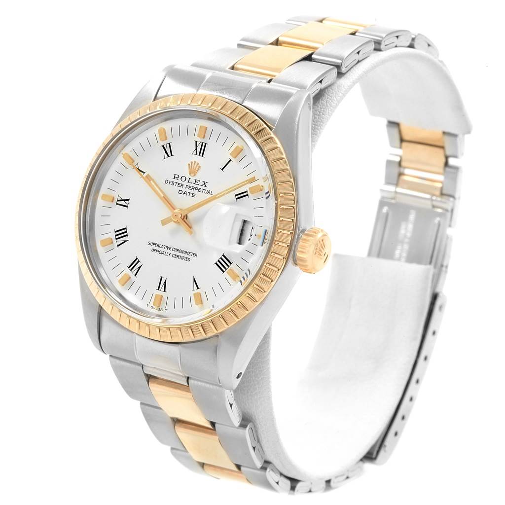 The Rolex Vintage Collection 1505 Men's Steel and Gold (two tone) White Dial 1505 Men's Steel and Gold (two tone) White Dial model is shown from a front angle, displaying its white dial, gold fluted bezel, and two-tone bracelet.