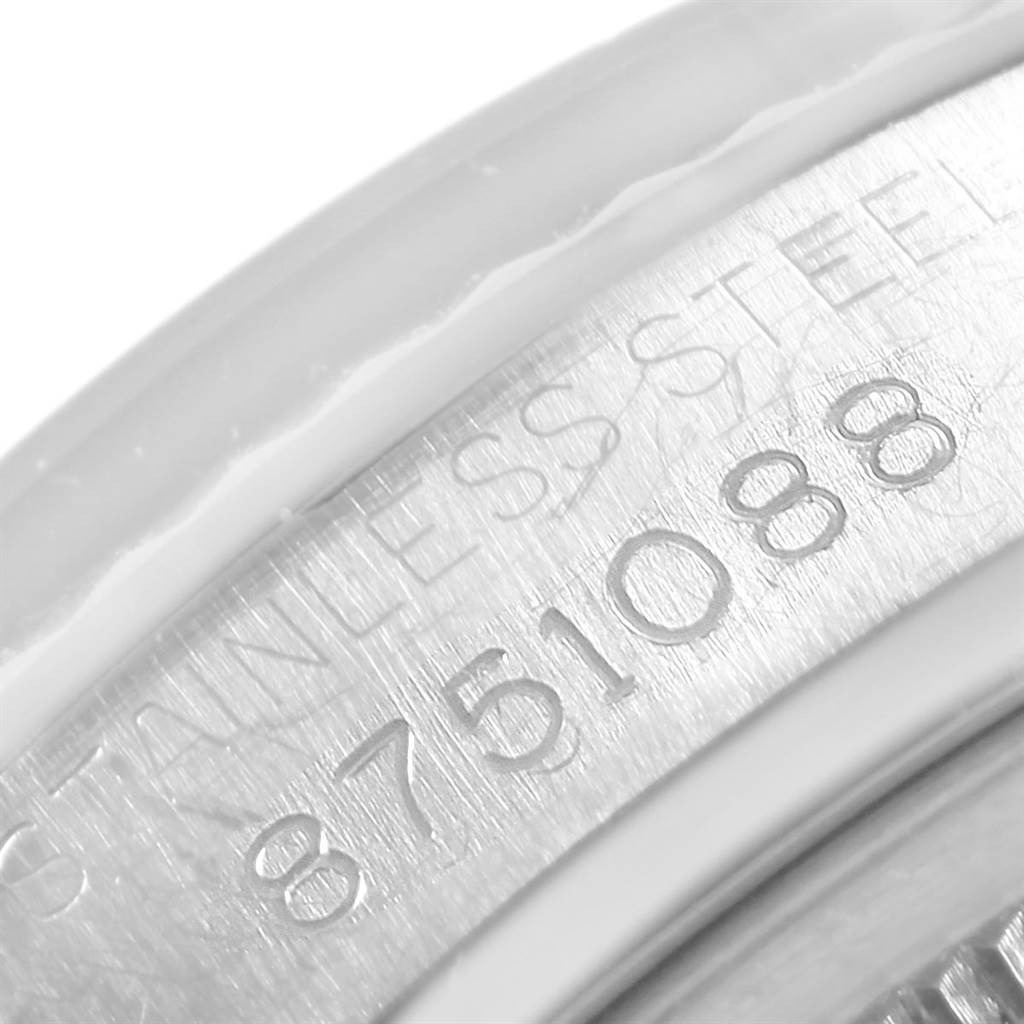 This close-up image shows the serial number engraved on the stainless steel casing of a Rolex Vintage Collection 16014 Men's Stainless Steel Silver Dial 16014 Men's Stainless Steel Silver Dial model watch.