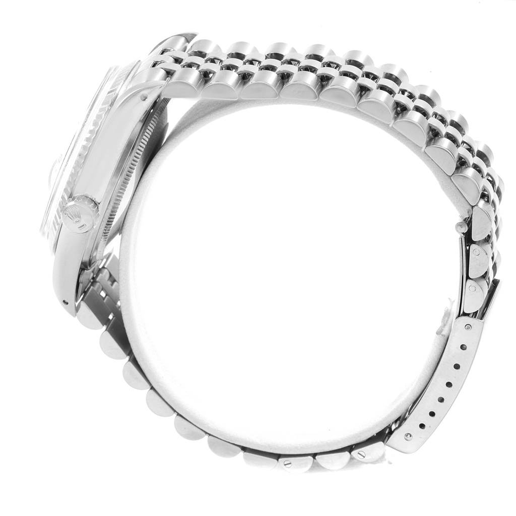 The image shows a side view of the Rolex Vintage Collection 16014 Men's Stainless Steel Silver Dial 16014 Men's Stainless Steel Silver Dial watch focusing on its band and case.