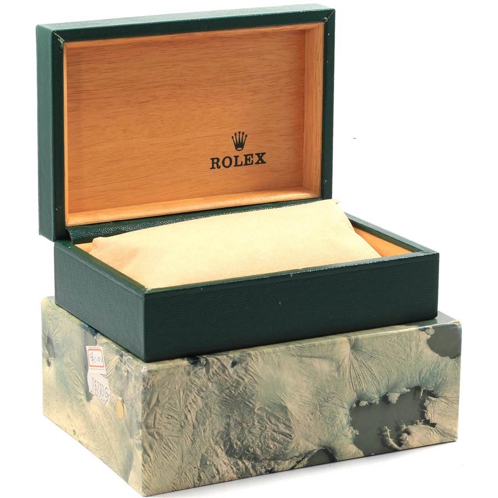 This image shows an open Rolex Vintage Collection 16014 Men's Stainless Steel Silver Dial 16014 Men's Stainless Steel Silver Dial watch box with the interior cushion.