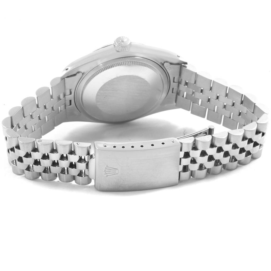 This image shows the back case and stainless steel bracelet of a Vintage Collection model by Rolex.