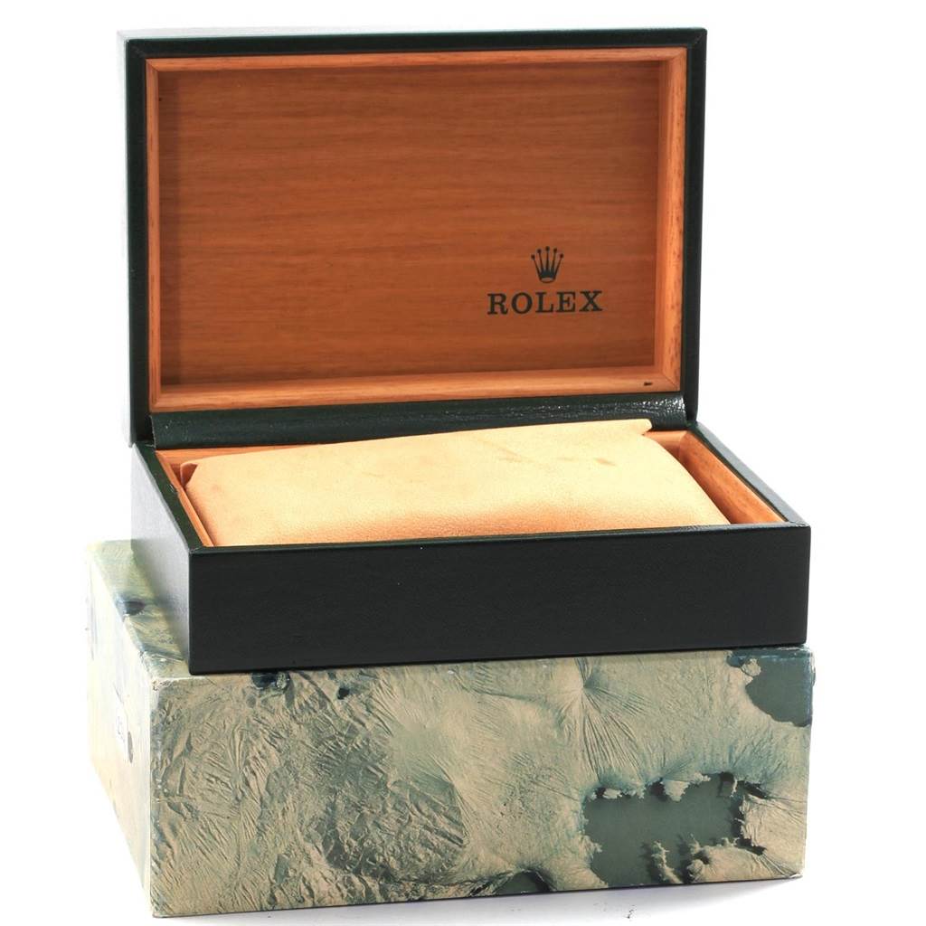 The image shows an open box for the Vintage Collection model by Rolex, featuring the brand's logo inside the lid.