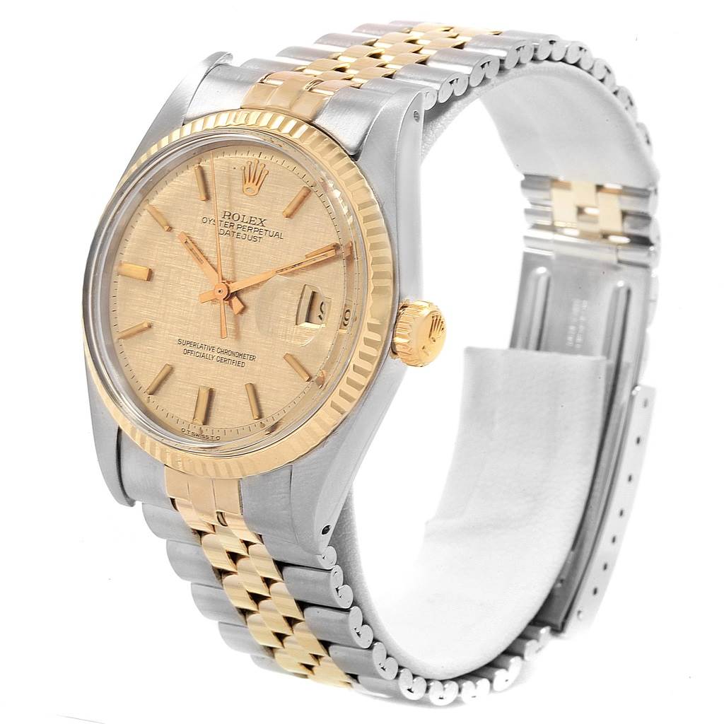 This image shows a side angle of the Rolex Vintage Collection 1601 Men's Steel and Gold (two tone) Champagne Dial 1601 Men's Steel and Gold (two tone) Champagne Dial watch, highlighting the dial, bezel, crown, and two-tone bracelet.