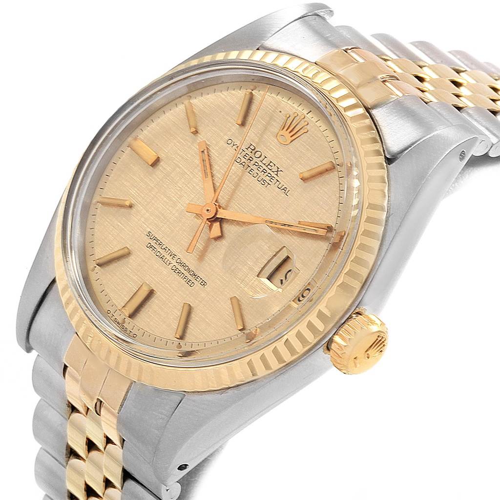 The Vintage Collection Rolex watch is shown from an angled, close-up view, highlighting its face, bezel, and part of the band.