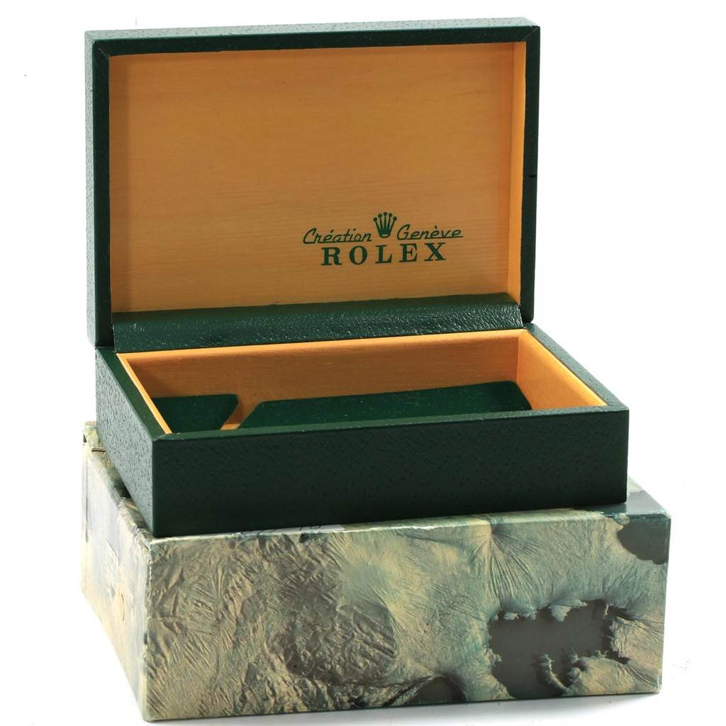 This image shows an open Rolex Vintage Collection 1601 Men's Steel and Gold (two tone) Champagne Dial 1601 Men's Steel and Gold (two tone) Champagne Dial watch box from an elevated angle.