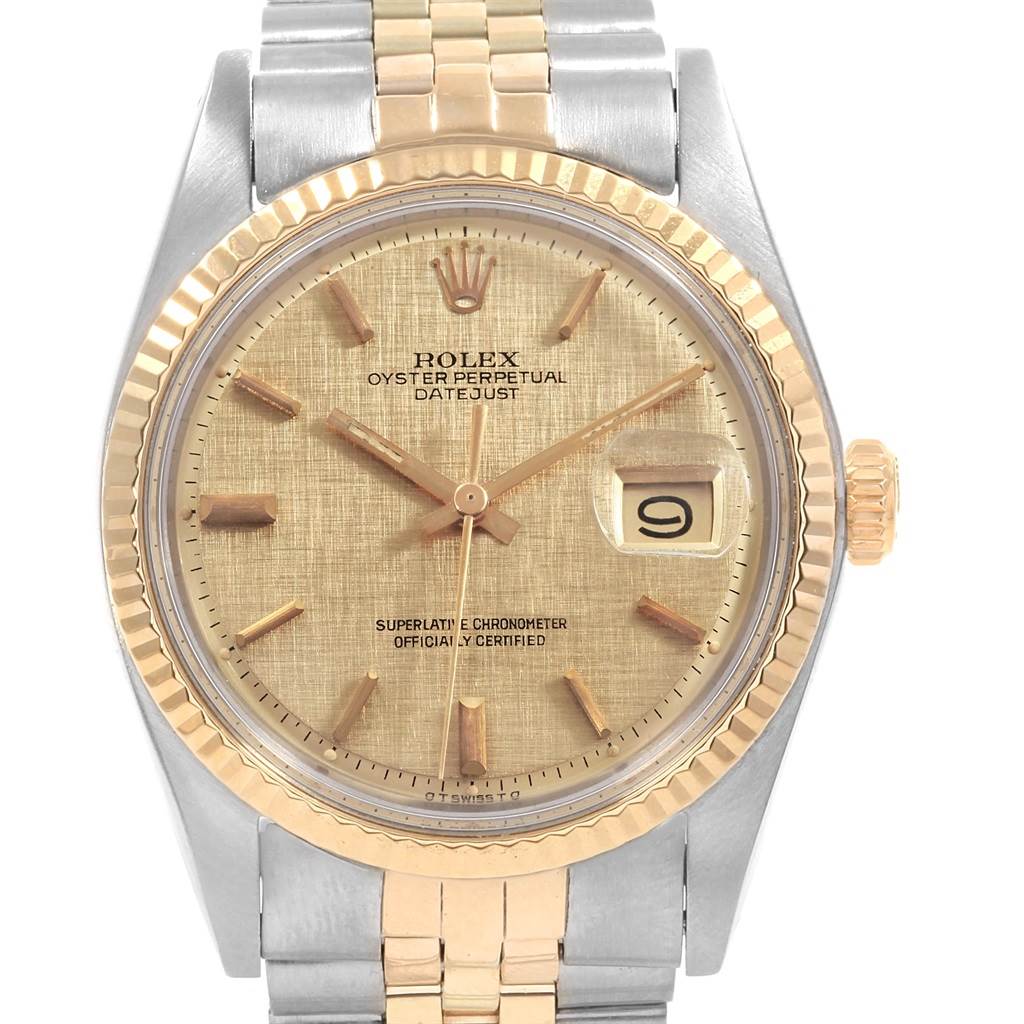 The image shows a front-facing Rolex Vintage Collection 1601 Men's Steel and Gold (two tone) Champagne Dial 1601 Men's Steel and Gold (two tone) Champagne Dial watch with a gold dial, fluted bezel, and two-tone bracelet.