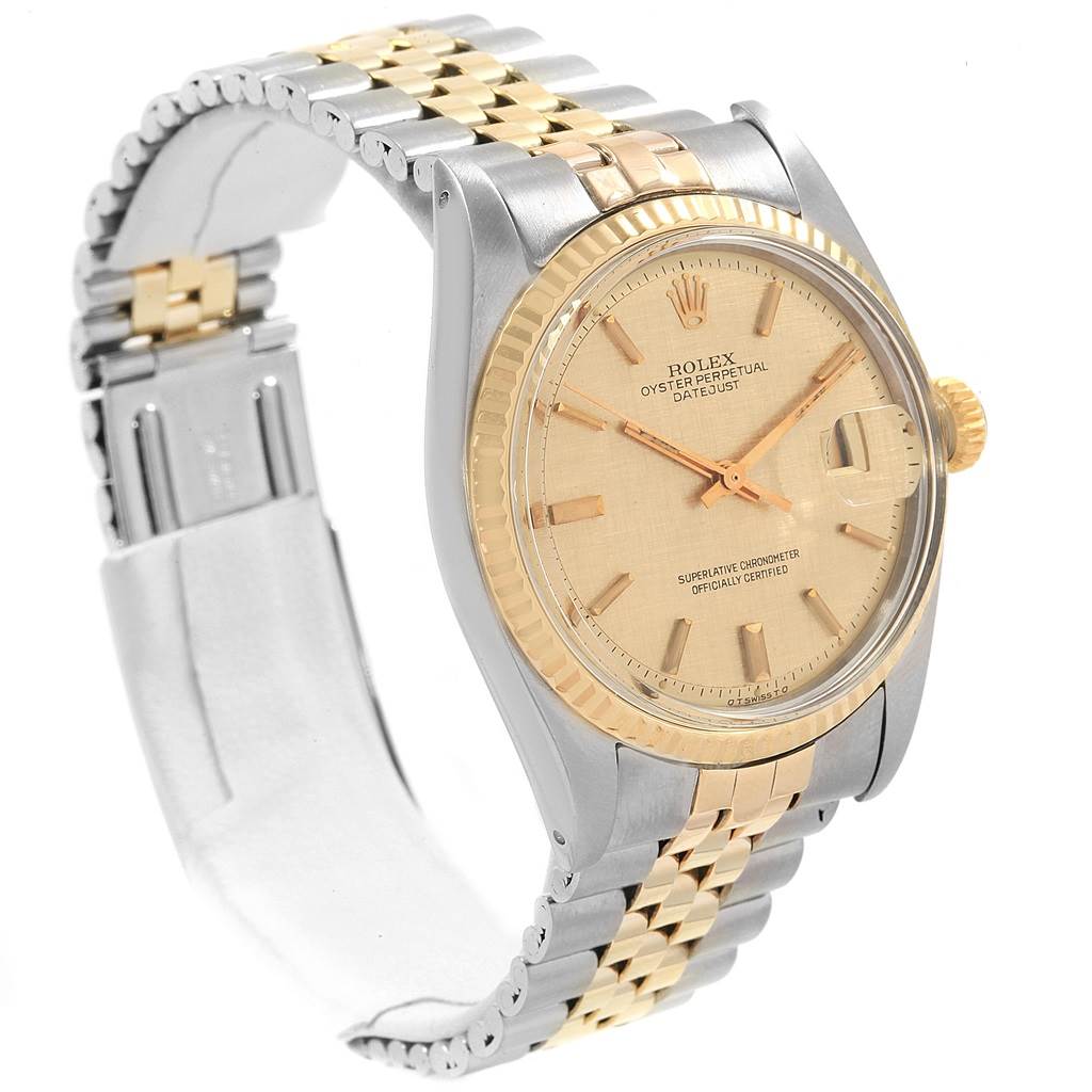 The image shows a side angle of the Rolex Vintage Collection 1601 Men's Steel and Gold (two tone) Champagne Dial 1601 Men's Steel and Gold (two tone) Champagne Dial watch, highlighting its dial, bezel, and two-tone metal bracelet.