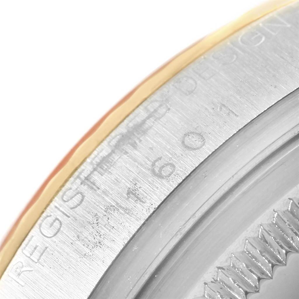 The image shows a close-up of the side engraving on the bezel of a Vintage Collection model by Rolex.