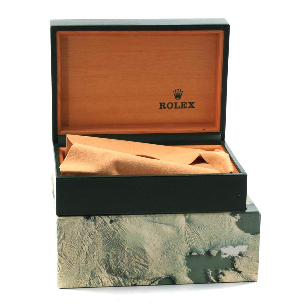 The image shows an open Rolex Vintage Collection 1601 Men's Stainless Steel Silver Dial 1601 Men's Stainless Steel Silver Dial watch box with a tan cushion inside.