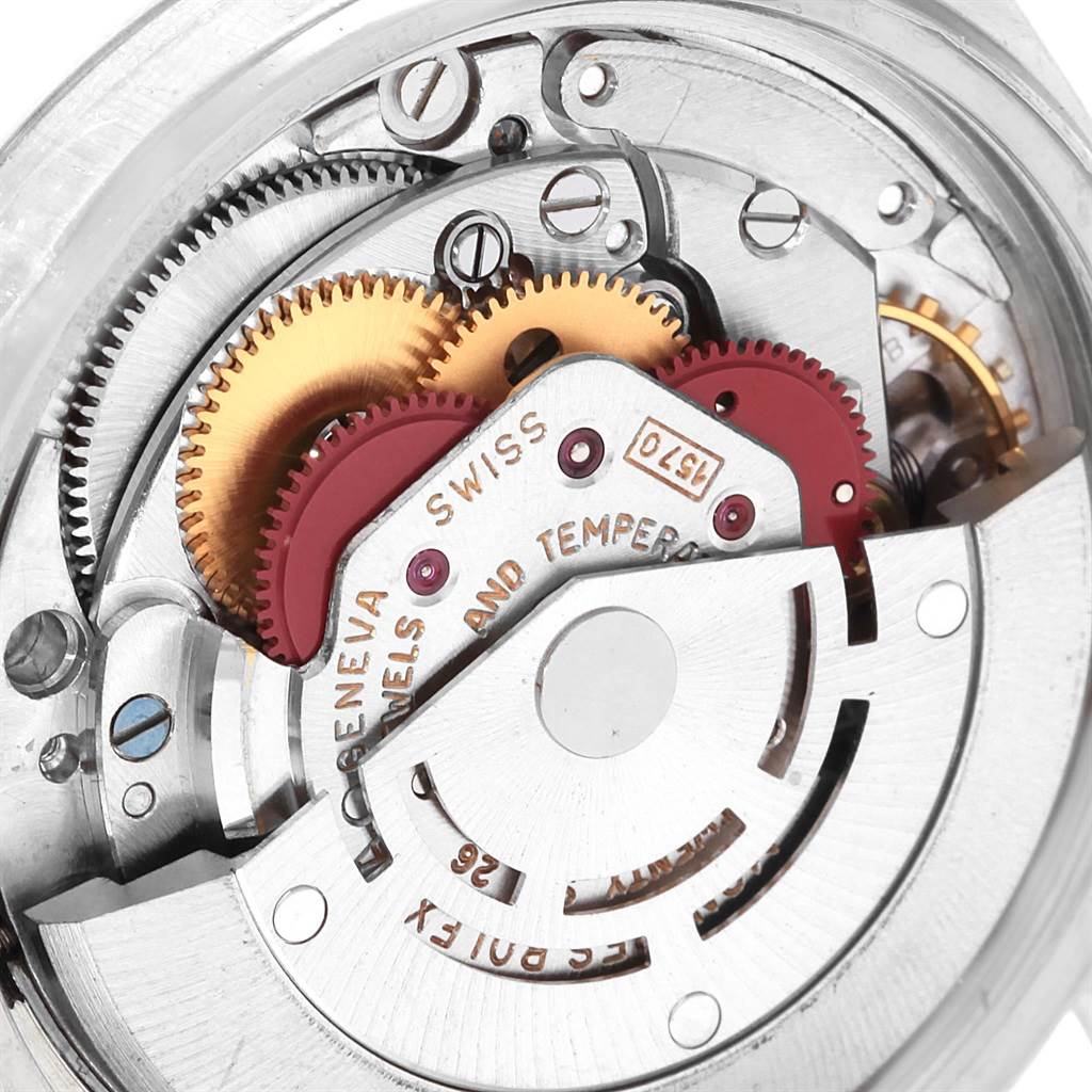 This close-up shows the intricate internal gears and components of the Rolex Vintage Collection 1601 Men's Stainless Steel Silver Dial 1601 Men's Stainless Steel Silver Dial watch movement.
