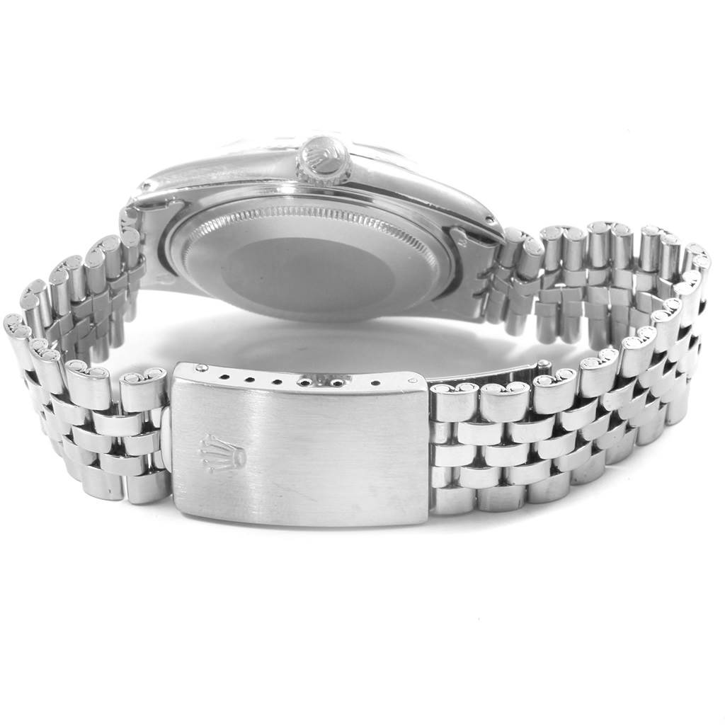 This Vintage Collection Rolex watch is shown from the back, displaying its stainless steel case and jubilee bracelet.