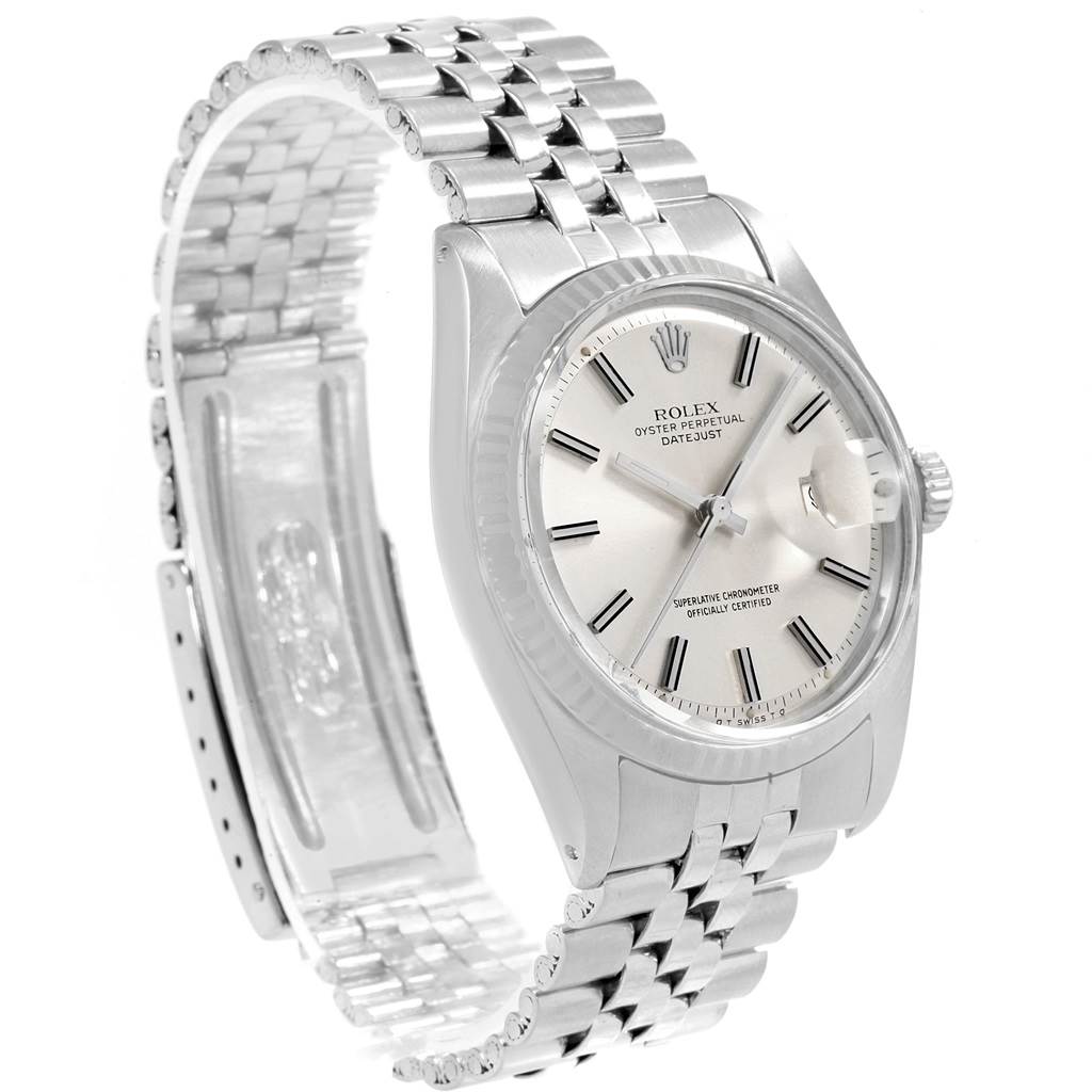 The image shows a Rolex Vintage Collection 1601 Men's Stainless Steel Silver Dial 1601 Men's Stainless Steel Silver Dial watch at an angle highlighting its face, crown, and partially open bracelet.