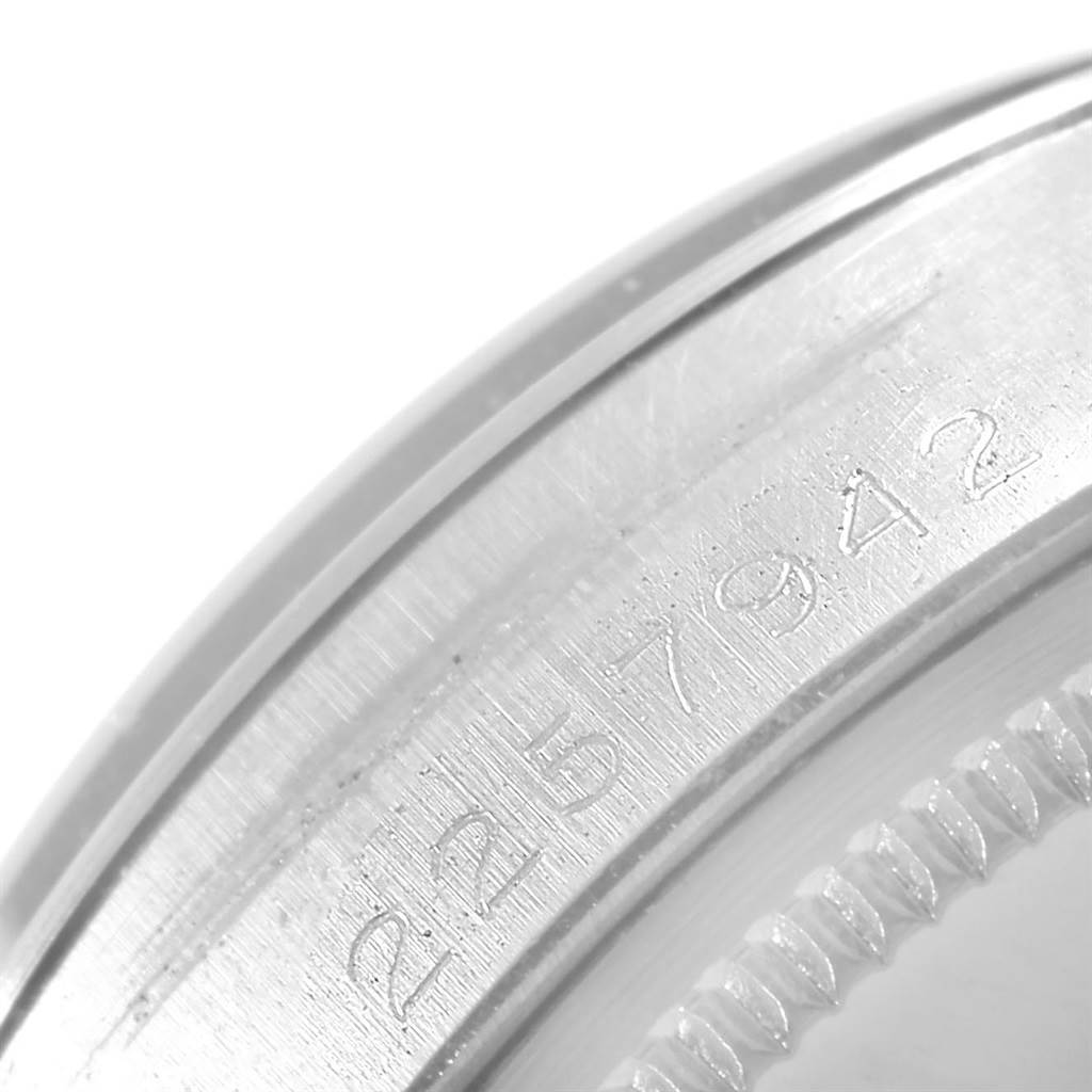 The image shows a close-up of the caseback edge engraving of a Rolex Vintage Collection 5500 Men's Stainless Steel Silver Dial 5500 Men's Stainless Steel Silver Dial watch.
