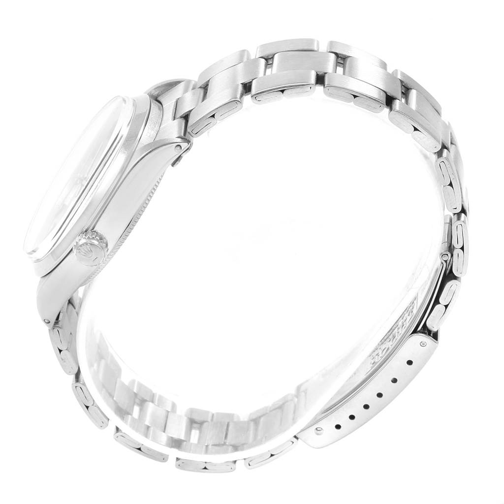 The image shows a side view of the Rolex Vintage Collection 5500 Men's Stainless Steel Silver Dial 5500 Men's Stainless Steel Silver Dial watch, focusing on the case and metal bracelet.