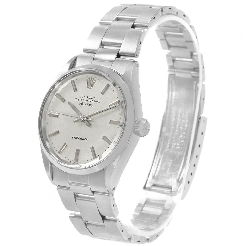 The image shows a Rolex Vintage Collection 5500 Men's Stainless Steel Silver Dial 5500 Men's Stainless Steel Silver Dial Air-King watch from a three-quarter angle, highlighting its dial, bezel, bracelet, and crown.