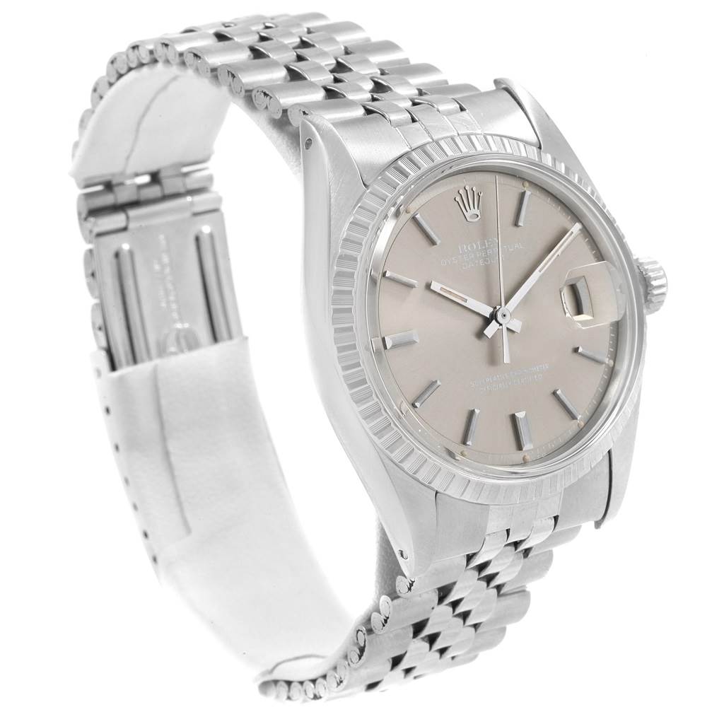 The Rolex Vintage Collection 1603 Men's Stainless Steel Grey Dial 1603 Men's Stainless Steel Grey Dial model watch is shown at a tilted angle, displaying its face, band, and clasp.