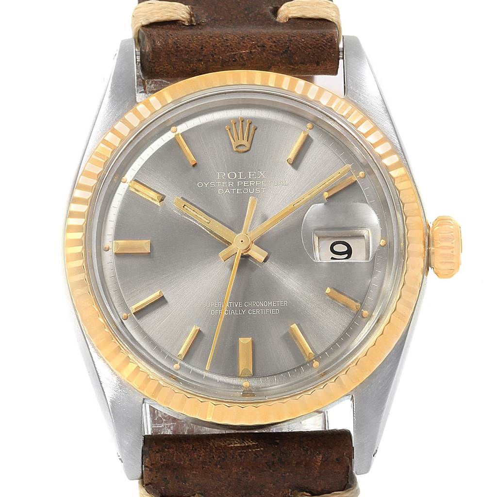 The image shows a frontal view of the Rolex Vintage Collection 1601 Men's Steel and Gold (two tone) Grey Dial 1601 Men's Steel and Gold (two tone) Grey Dial watch, featuring a silver dial, gold accents, bezel, and a date display.