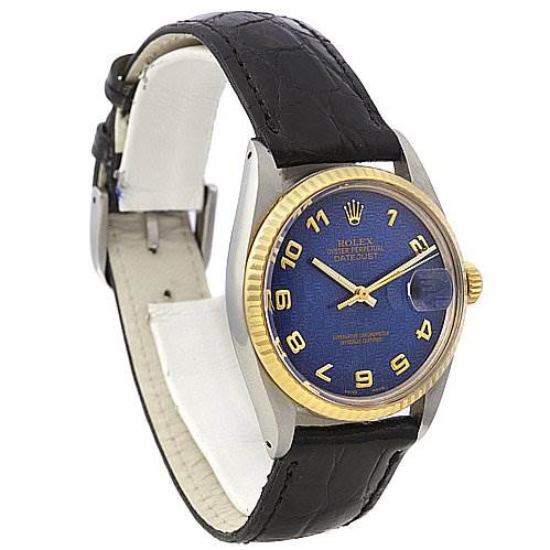 This image shows a Vintage Collection Rolex watch with a blue dial, gold bezel, and black leather strap at a three-quarter angle.