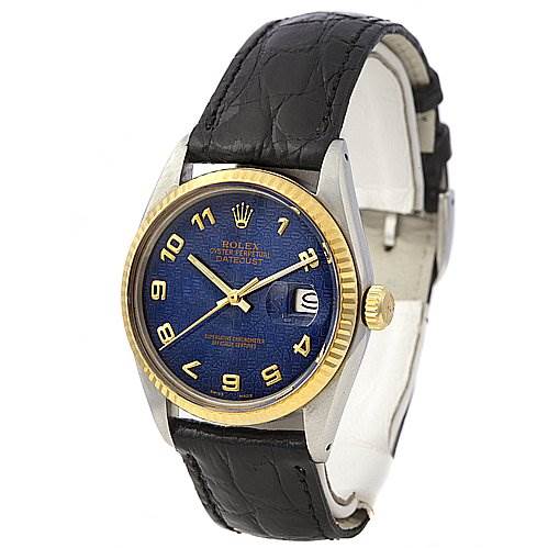 The image shows a front angle view of the Rolex Vintage Collection 16013 Men's Stainless Steel Blue Dial 16013 Men's Stainless Steel Blue Dial watch, highlighting its blue dial, gold bezel, and black leather strap.