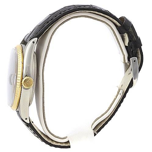 The image shows a side view of the Rolex Vintage Collection 16013 Men's Stainless Steel Blue Dial 16013 Men's Stainless Steel Blue Dial watch, highlighting the crown, bezel, and band.